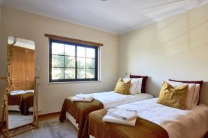 Ένα ή περισσότερα κρεβάτια σε δωμάτιο στο Carcavelos Apartment