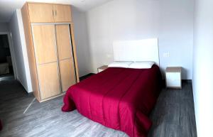 Łóżko lub łóżka w pokoju w obiekcie Apartamentos MareaBeach