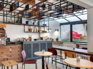 Restaurace v ubytování Hôtel ibis Styles Clermont-Ferrand Gare