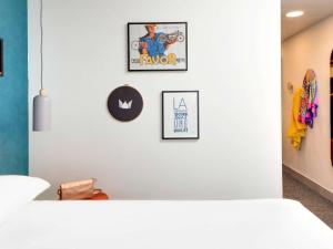Postel nebo postele na pokoji v ubytování Hôtel ibis Styles Clermont-Ferrand Gare