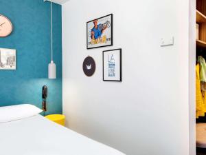 Postel nebo postele na pokoji v ubytování Hôtel ibis Styles Clermont-Ferrand Gare