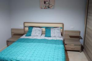 Ein Bett oder Betten in einem Zimmer der Unterkunft Tawaya Sahl Hasheesh