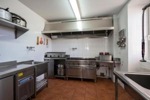Кухня или мини-кухня в Albergue de Sargentes de la Lora
