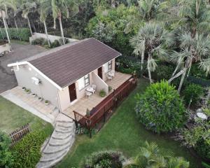 an aerial view of a house with a deck at Sunbirds Bed & Breakfast in Southbroom