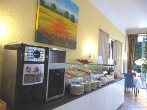 Kuchyň nebo kuchyňský kout v ubytování Hotel Excelsior
