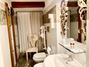 Koupelna v ubytování Art Hotel Al Fagiano