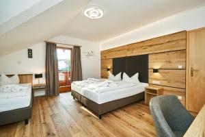 Postel nebo postele na pokoji v ubytování Hotel Rupertihof