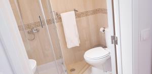 Koupelna v ubytování TOPO Apartment + 7 fotografií