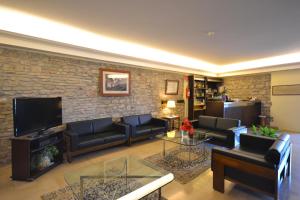 Uma TV ou centro de entretenimento em Hotel Il Castello