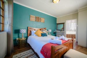 Postel nebo postele na pokoji v ubytování Amber Collection