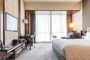 Postel nebo postele na pokoji v ubytování Crowne Plaza Zhangzhou by IHG