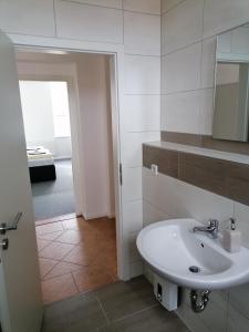 Een badkamer bij Apartment Bona Loca