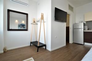 Televízia a/alebo spoločenská miestnosť v ubytovaní EnVi Apartments + 32 fotografií