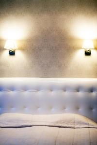 Postel nebo postele na pokoji v ubytování Hotel Felicia