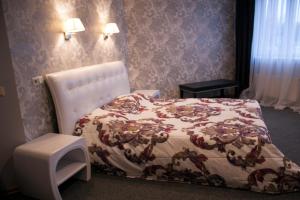 Postel nebo postele na pokoji v ubytování Hotel Felicia