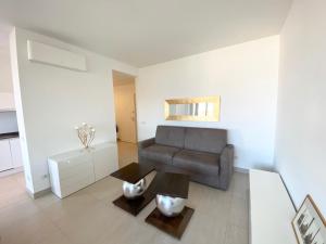 Posezení v ubytování Appartamento Palazzo di Vetro