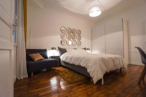 Ένα ή περισσότερα κρεβάτια σε δωμάτιο στο Large Flat At 2 Steps From The Eiffel Tower