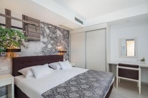 Voodi või voodid majutusasutuse Hotel Tamaris toas