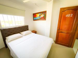 Hotel Aeromar Central客房内的一张或多张床位