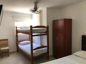 Hotel Aeromar Central客房内的一张或多张床位