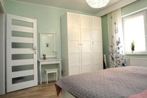 Katil atau katil-katil dalam bilik di Apartament BLUE MOON 2 -pokojowy