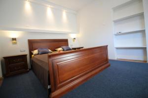 En eller flere senge i et værelse på Apartment City Centre free parking 1&2 floor