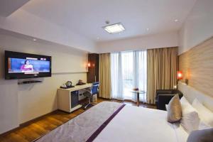 Spree Shivai Hotel Pune客房内的一张或多张床位