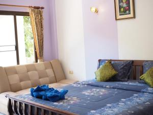 Postel nebo postele na pokoji v ubytování MossMan House