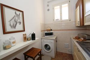 Køkken eller tekøkken på Rosa Dei Venti - Aparment in the heart of Bellagio with parking