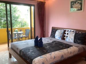 Postel nebo postele na pokoji v ubytování MossMan House