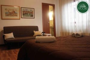 A bed or beds in a room at La Casetta