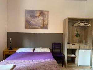 Cama ou camas em um quarto em Villa Paraíso