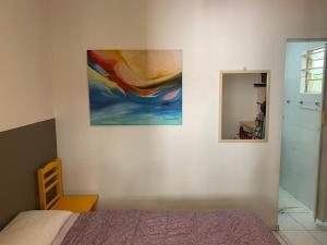 Cama ou camas em um quarto em Villa Paraíso