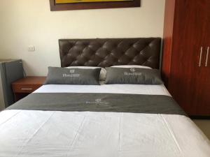 Hotel Aeromar Central客房内的一张或多张床位