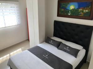 Hotel Aeromar Central客房内的一张或多张床位