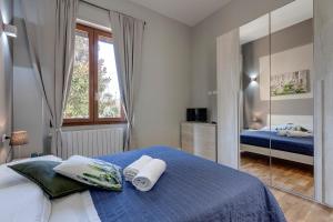 Postel nebo postele na pokoji v ubytování Sleep Tight Florence (Rooms)