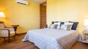 Posteľ alebo postele v izbe v ubytovaní CASA DEL VENTO 10, Emma Villas