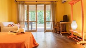 Posteľ alebo postele v izbe v ubytovaní CASA DEL VENTO 10, Emma Villas