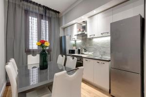 Kuchyň nebo kuchyňský kout v ubytování Sleep Tight Florence (Rooms)