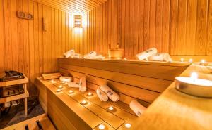 a sauna with a row of shoes in it at Hotel Urban in Plovdiv