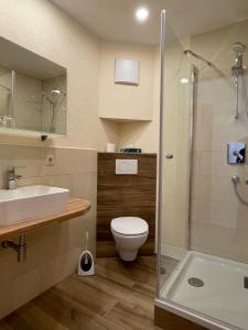 Een badkamer bij Hotel Andrea