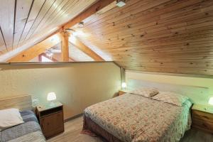 Postel nebo postele na pokoji v ubytování Appartement spacieux à Échenans de 80 m² avec parking inclus