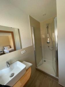 Een badkamer bij Hotel Andrea