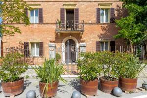 Vonkajšia záhrada v ubytovaní VILLA ANGELINI 14&7, Emma Villas