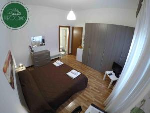 A bed or beds in a room at La Casetta