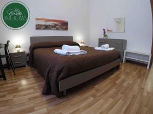 A bed or beds in a room at La Casetta