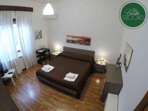 A bed or beds in a room at La Casetta