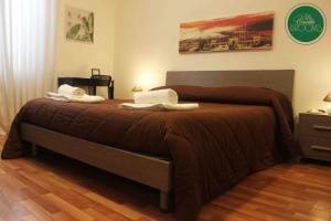 A bed or beds in a room at La Casetta
