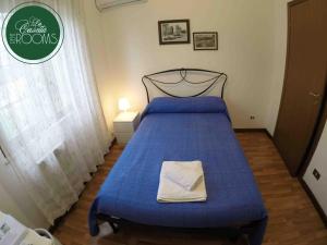 A bed or beds in a room at La Casetta