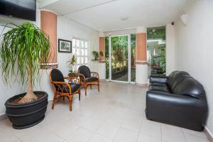 Posezení v ubytování Hotel Kiin Cozumel